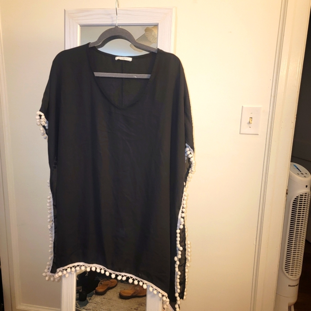 Swimsuit cover up. One size fits all.